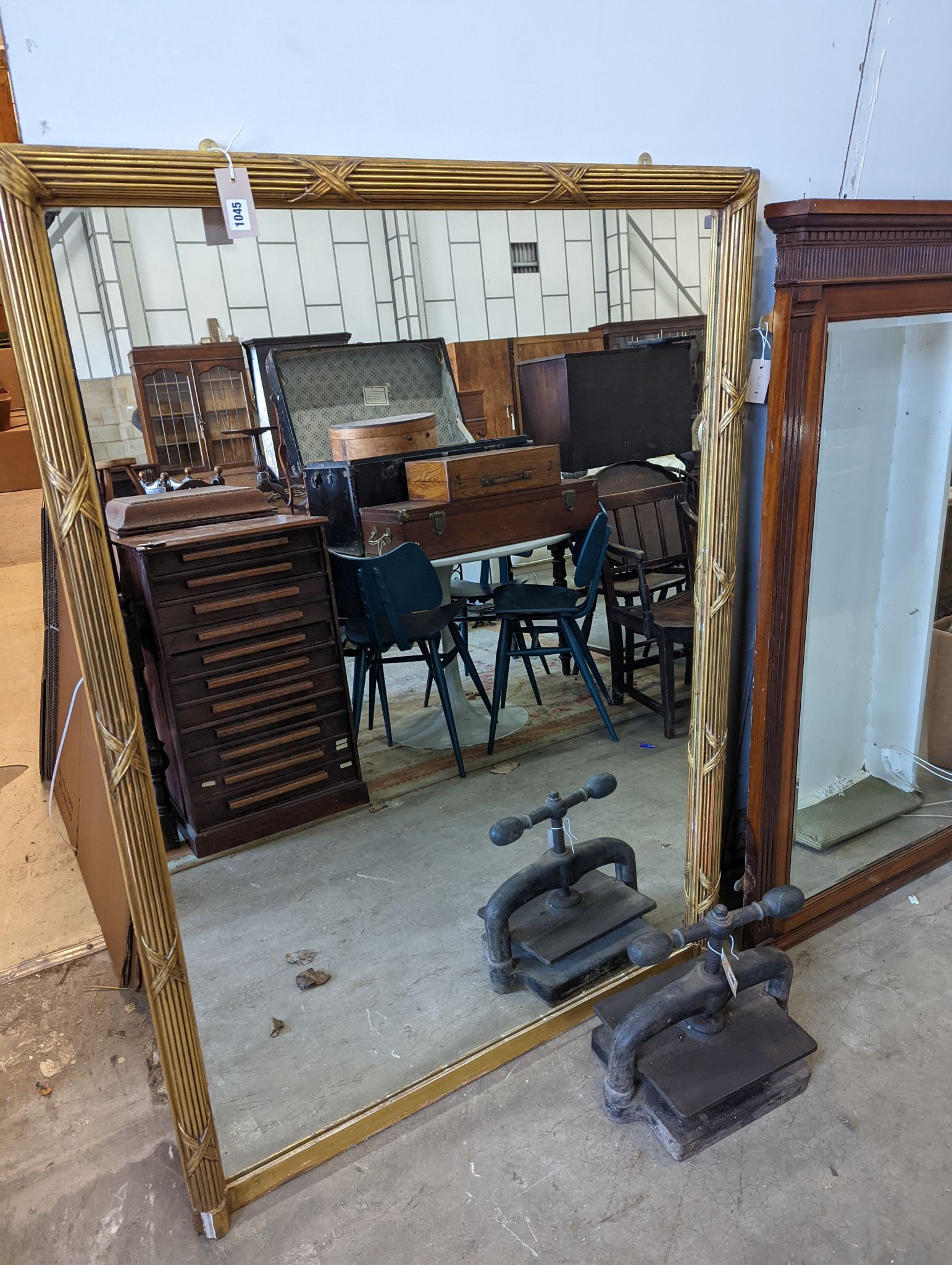 A large rectangular gilt framed overmantel mirror, width 108cm, height 158cm